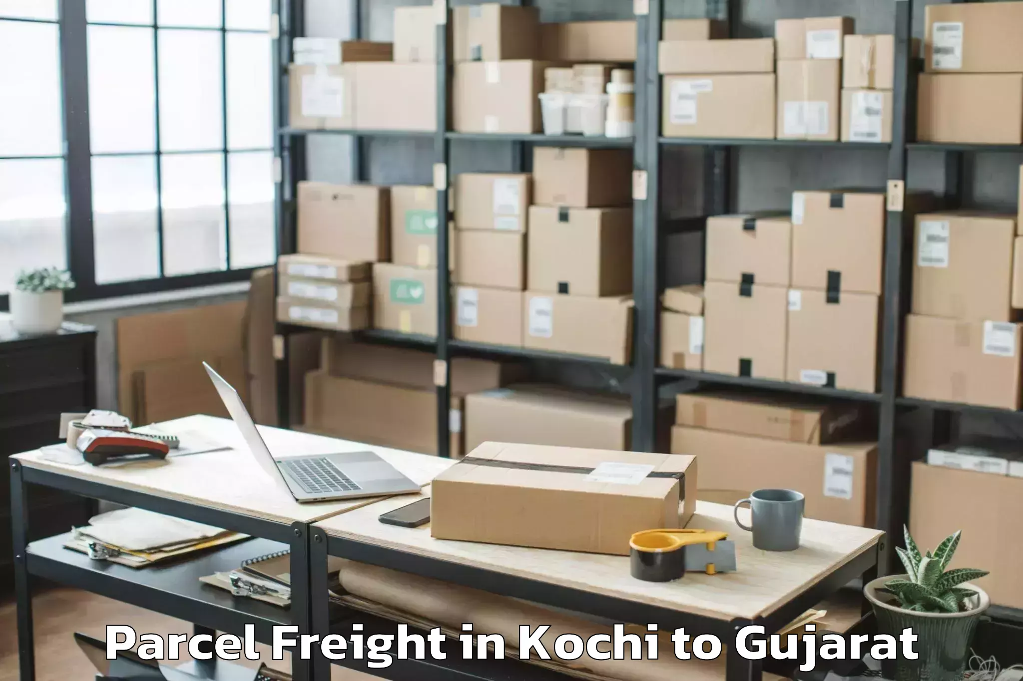 Easy Kochi to Vadgam Parcel Freight Booking